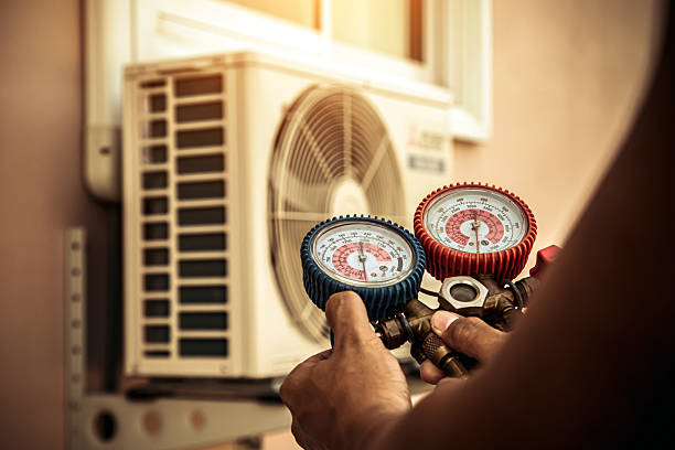Professional Ac Installation technician working in Hartselle, AL